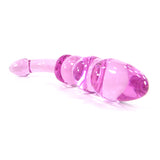 Curved pink glass dildo